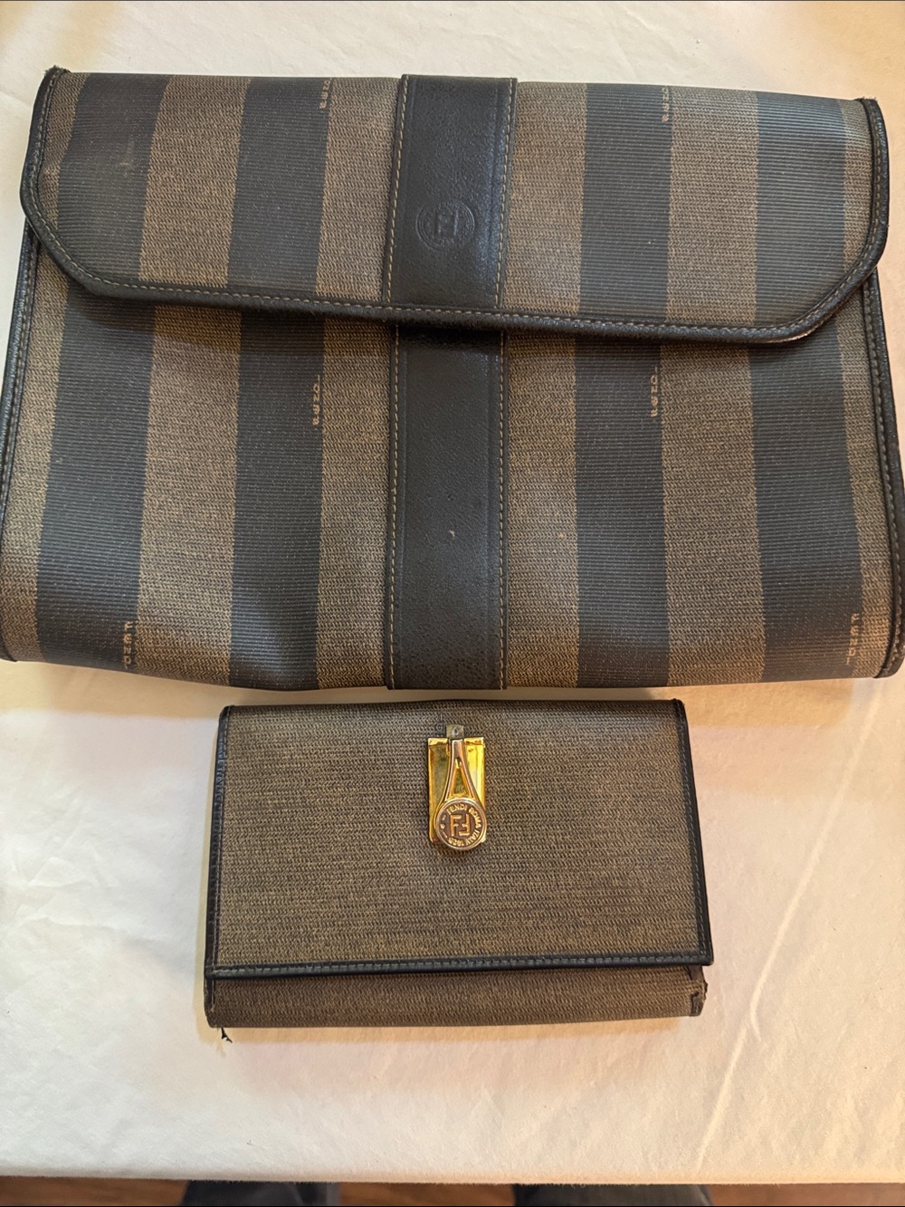 Fendi set! Clutch and wallet. Shows wear and edges have some fraying.